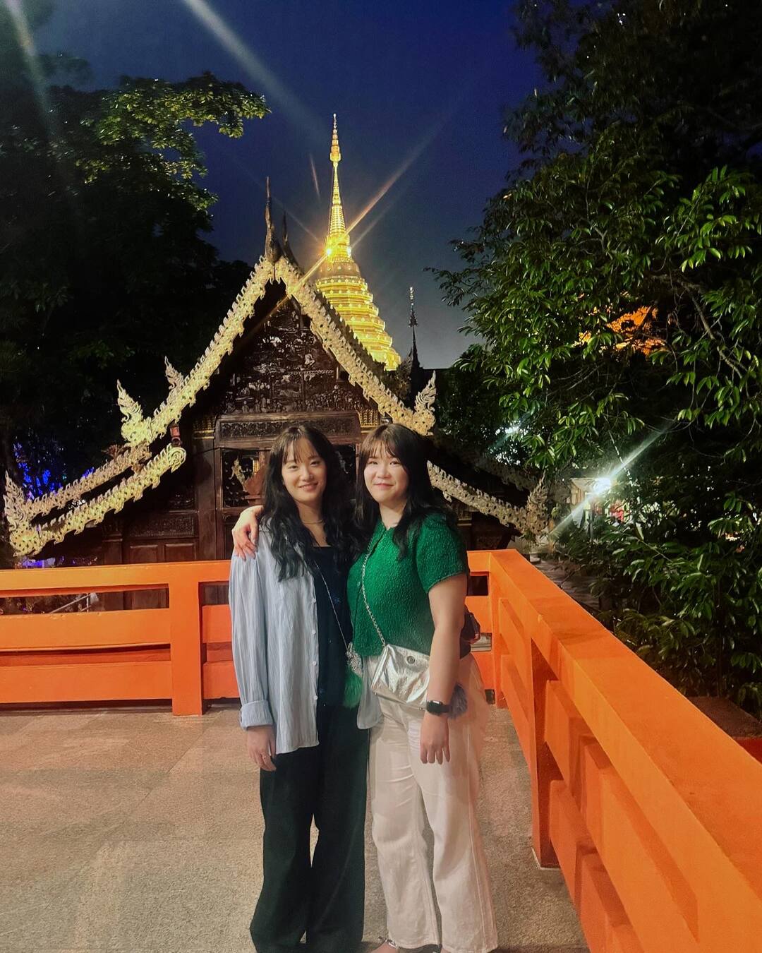 Friends at the temple at night