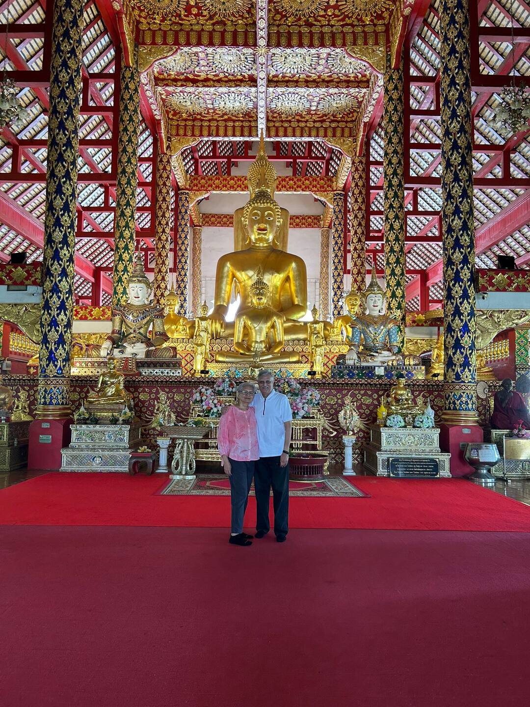 Guests inside the golden hall of Wat Suan Dok