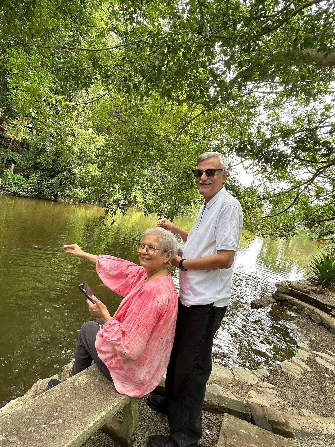 Guests by the pond at Wat Umong
